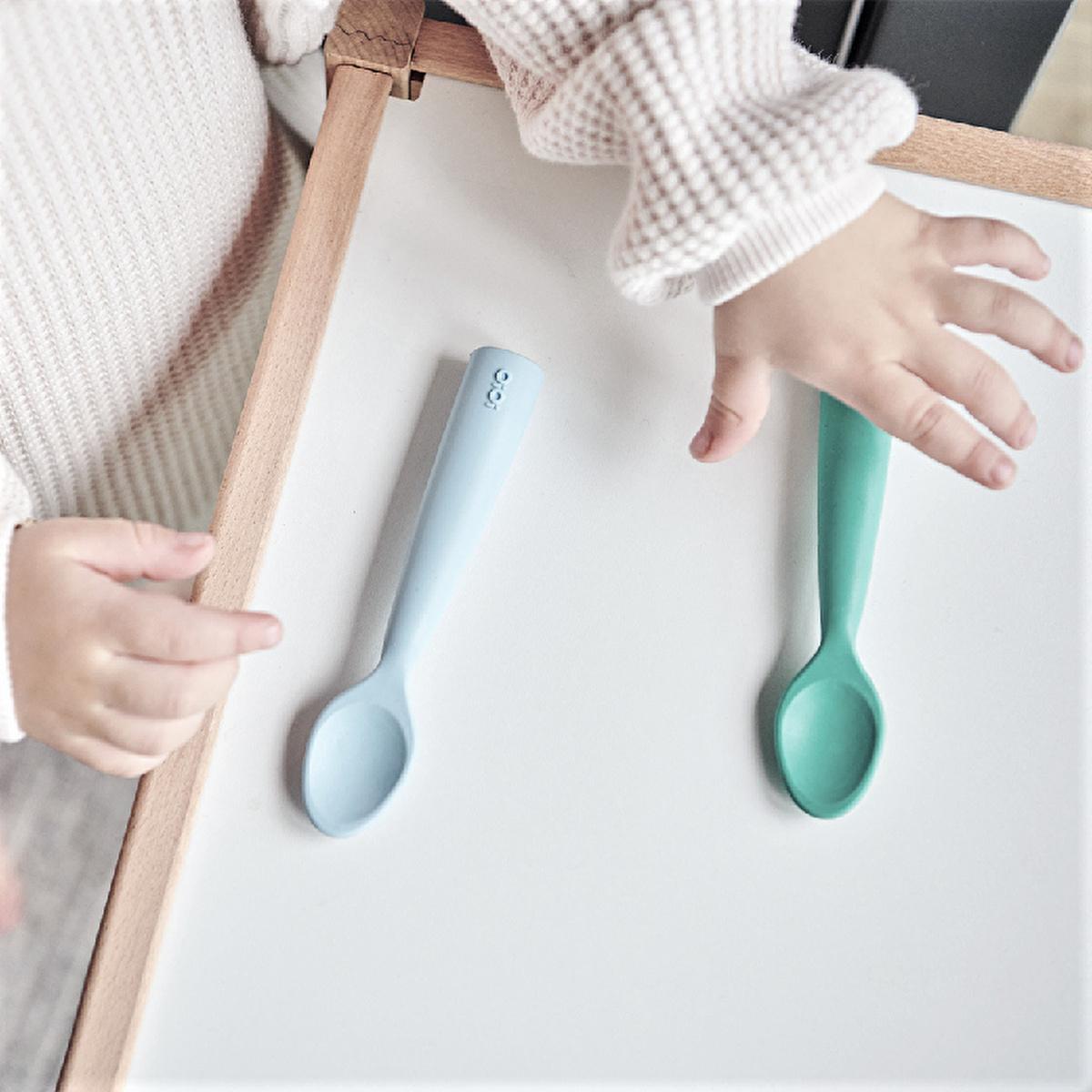OiOi Mama Baby Spoon - Soft Silicone, Safe Feeding, Develops Fine Motor Skills OiOi Mama Baby Spoon - Safe & Gentle Feeding baby spoon, silicone baby spoon, safe baby utensils, gentle baby feeding, fine motor skills development, food grade silicone baby products, Turkish made baby spoon, baby feeding essentials, baby gift ideas, newborn baby products