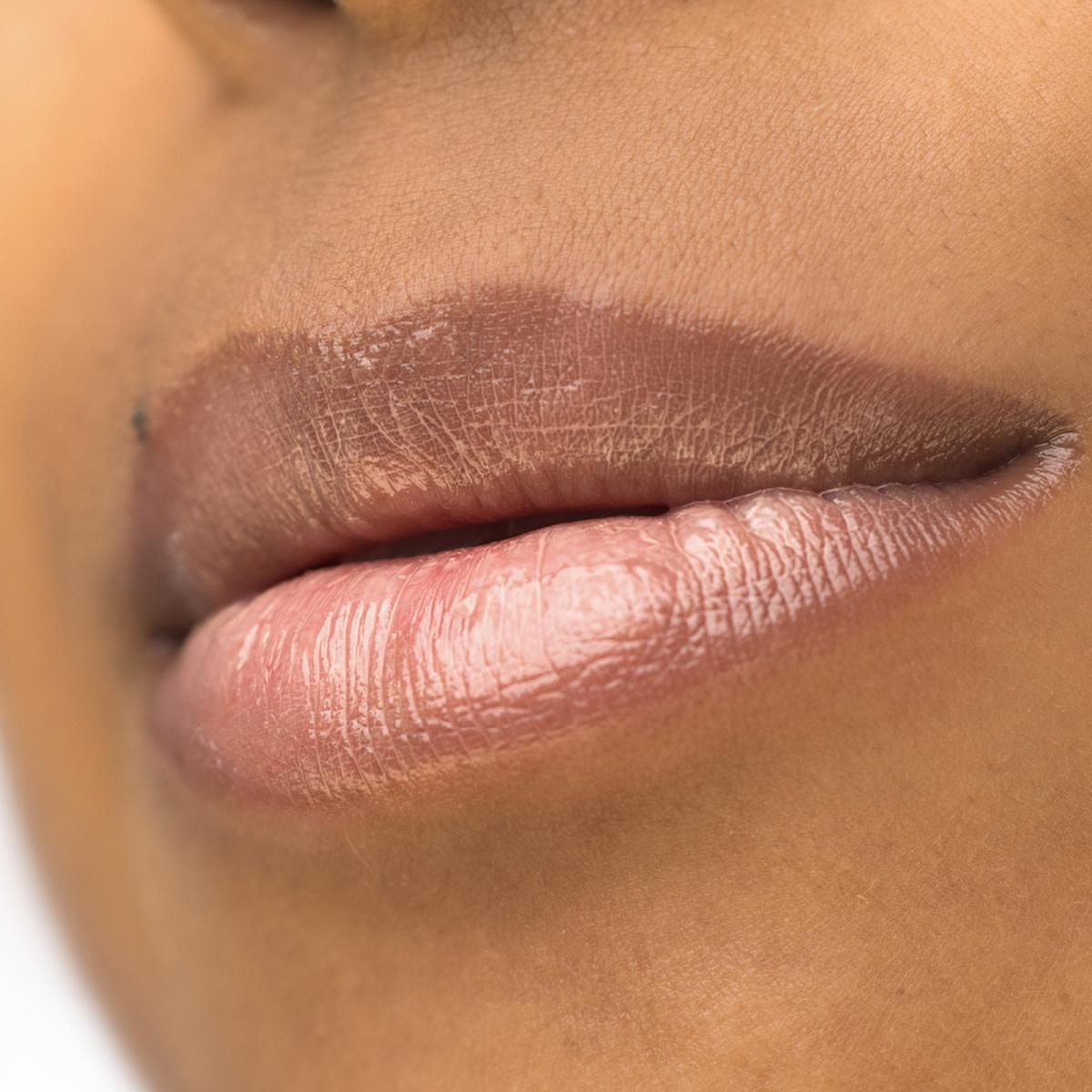 theBalm Instant Plump Your Pucker Lip Gloss: Volumizing, Hydrating, Non-Sticky Formula with Jojoba & Avocado Oil - Howdy Honey Shade theBalm Lip Plumper: Volumizing Gloss, Jojoba & Avocado Oil lip plumper, volumizing lip gloss, jojoba oil lip gloss, avocado oil lip gloss, non-sticky lip gloss, theBalm lip gloss, lip gloss Howdy Honey, natural lip plumper, plumping lip gloss, lip gloss, lip care, beauty, cosmetics, makeup, lip enhancement, lip volume, hydration, moisturizing lip gloss, non-sticky, comfortabl