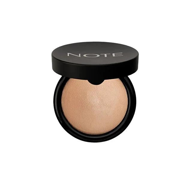 Note Cosmetics Baked Highlighter Powder: Shimmering Gold Bronze Face Illuminator with Macadamia Oil for Radiant Skin Note Baked Highlighter: Gold Bronze Shimmer for Radiant Skin baked highlighter powder, shimmering face powder, illuminating makeup, macadamia oil highlighter, radiant finish powder, gold bronze highlighter, ışıltılı bitişli pudra, highlighter toz, face highlighting powder, bronze highlighter, highlighter, face powder, highlighting powder, luminous complexion, nourishing cosmetics, makeup enth