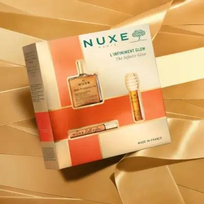 nuxe infinite glow gift set, nuxe huile prodigieuse multi-purpose dry oil, nuxe huile prodigieuse or roll and glow, nuxe reve de miel lip balm Nuxe Infinite Glow Gift Set - Radiant Skincare Essentials | 100 ml Nuxe Infinite Glow Gift Set - Radiant Skincare Essentials nuxe, gift-set, skincare, radiance, beauty, lip-balm, multi-purpose-oil, self-care, unisex, ai-generated