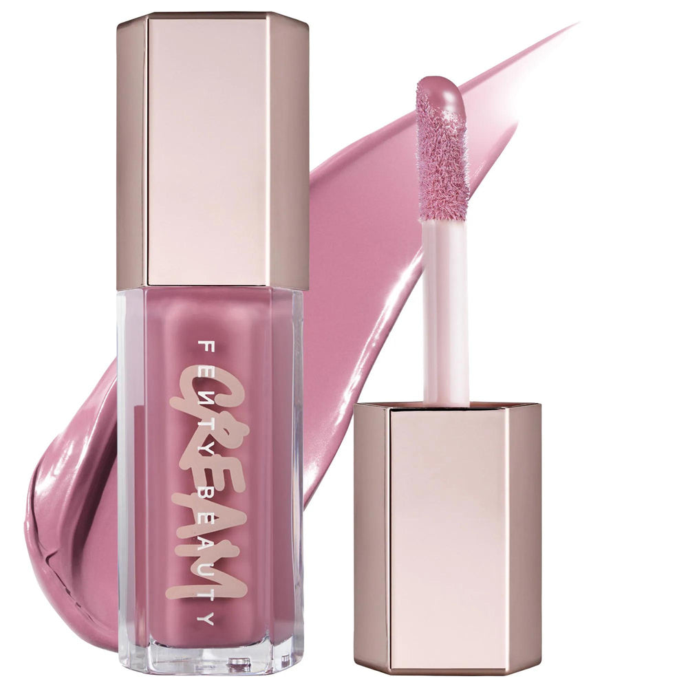 Fenty Beauty Gloss Bomb Cream Color Drip Lip Cream: Full Coverage, Non-Sticky & Hydrating Lip Gloss for Luscious Shine Fenty Beauty Lip Gloss: Creamy Color & Shine | Full Coverage lip gloss, creamy lip gloss, shine lip gloss, full coverage lip gloss, non-sticky lip gloss, peach vanilla lip gloss, hydrating lip gloss, gloss bomb cream, color drip lip cream, lip color, lip shine, beauty, cosmetics, makeup, lip care, cruelty-free, vitamin A, peach scent, vanilla scent, glossy lips, fuller lips, voluminous lips