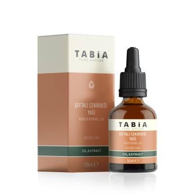 tabia peach kernel oil 50 ml bottle, close-up of tabia peach kernel oil Tabia Peach Kernel Oil - Natural Facial Treatment | 50 ml Tabia Peach Kernel Oil - 50 ml tabia, peach-kernel-oil, natural-skincare, facial-oil, oily-skin, skin-tightening, beauty, oil-based, skincare, ai-generated