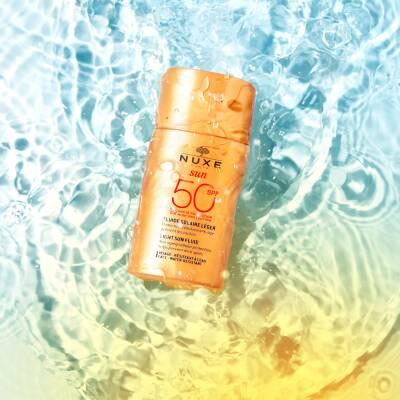 Nuxe Sun SPF 50 Facial Sunscreen: Lightweight Anti-Aging Sun Protection for Face, Water Resistant - 50ml Nuxe Sun SPF 50: Anti-Aging Facial Sunscreen SPF 50 sunscreen, facial sunscreen, sun protection, anti-aging sunscreen, water resistant sunscreen, lightweight sunscreen, sunscreen for face, sunscreen for normal skin, sunscreen for combination skin, sunscreen, face sunscreen, broad spectrum sunscreen, non-greasy sunscreen, Tahitian Gardenia, Vanilla, sun protection for face, anti-aging, skincare, beauty, p