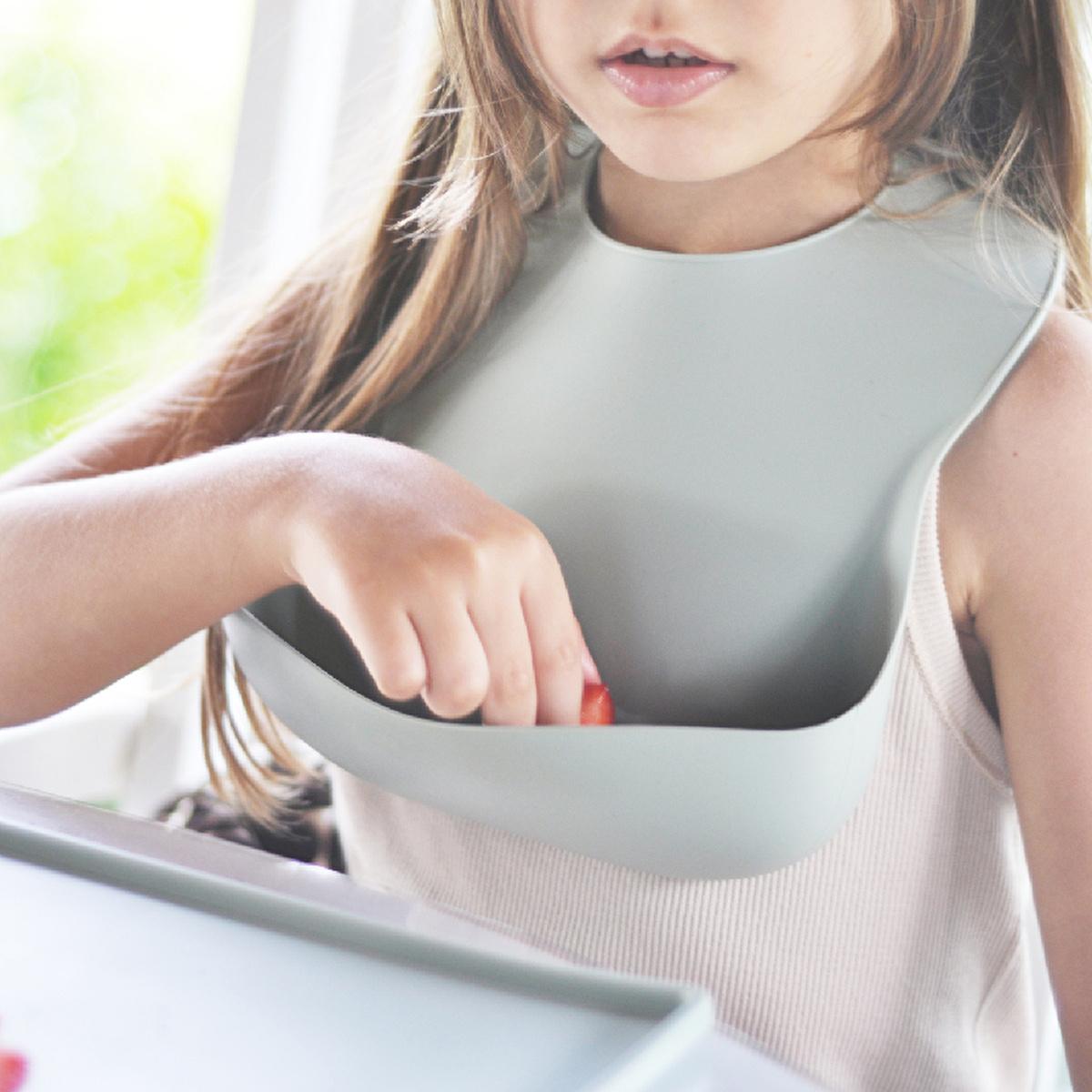 OiOi Basics Baby Bib - Soft Silicone, Easy Clean, and Sterilizable for Sensitive Skin OiOi Basics Baby Bib - Soft & Easy Clean baby bib, silicone bib, food-grade silicone baby products, easy clean baby bib, sterilizable baby bib, baby feeding accessories, baby essentials, baby gifts, newborn gifts, baby shower gifts, mealtime accessories