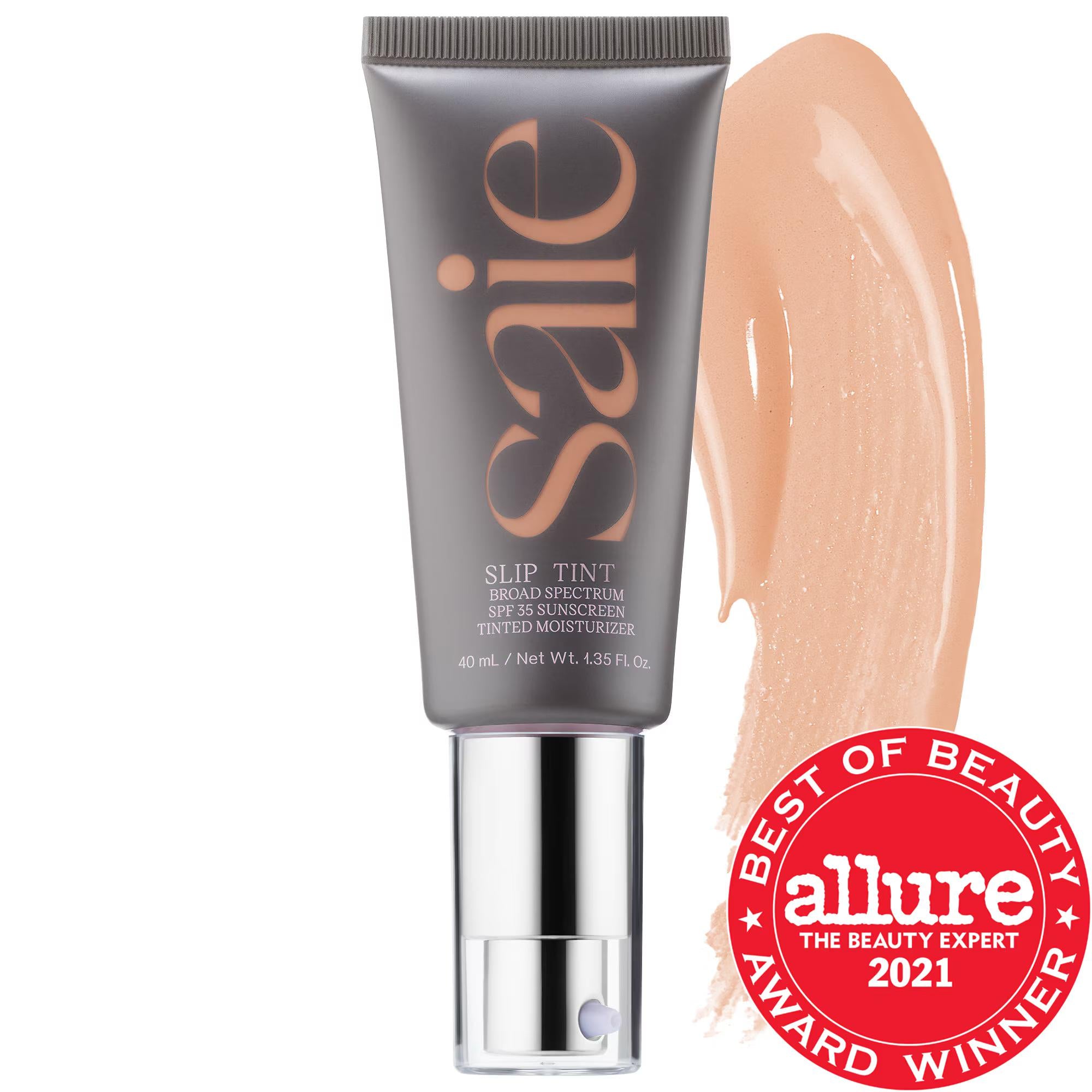 Saie Slip Tint - Lightweight Tinted Moisturizer with SPF 35, Hyaluronic Acid & Licorice Root Extract - Clean Beauty, Cruelty-Free, Gluten-Free Saie Slip Tint - Tinted Moisturizer with SPF 35 & Hyaluronic Acid tinted moisturizer, SPF 35, non-comedogenic, clean beauty, cruelty-free, gluten-free, hyaluronic acid, zinc oxide, lightweight coverage, sustainable packaging, natural makeup, radiant finish, dewy finish, skincare-infused makeup, busy mornings, sensitive skin, acne-prone skin, everyday makeup, no-makeu