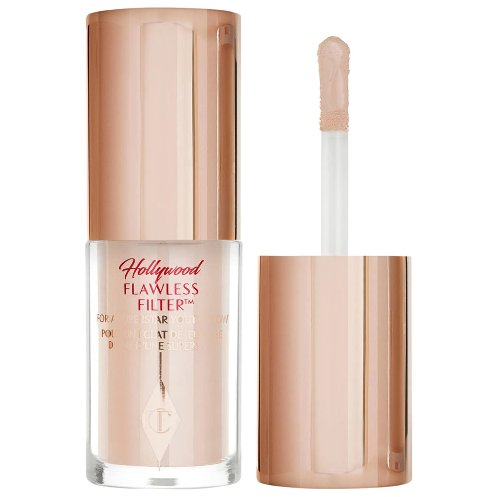 Charlotte Tilbury Mini Hollywood Flawless Filter Complexion Booster - Liquid Primer, Radiant Finish, Gluten-Free & Cruelty-Free Mini Hollywood Flawless Filter Complexion Booster by Charlotte Tilbury complexion booster, liquid primer, radiant finish, gluten-free cosmetics, cruelty-free beauty products, Charlotte Tilbury, Mini Hollywood Flawless Filter, natural look, everyday wear, glowing skin, smooth complexion, customizable primer, mini size, travel-friendly, beauty essentials, makeup, primer, face product
