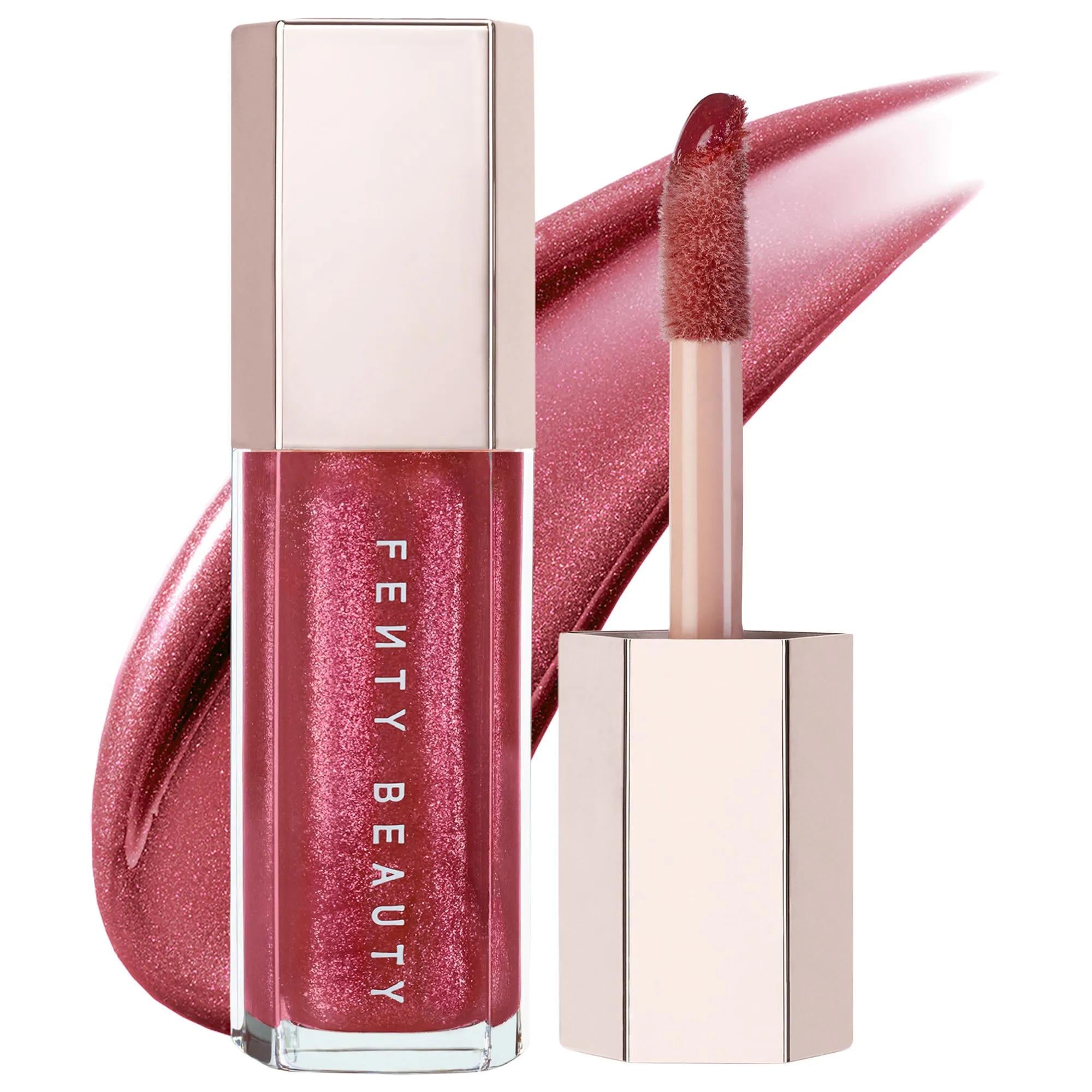 Fenty Beauty Gloss Bomb: Universal Lip Luminizer - Explosive Shine, Hydrating Shea Butter, Non-Sticky, Flattering Lip Gloss for All Skin Tones Fenty Beauty Gloss Bomb: Shiny, Hydrating Lip Gloss lip gloss, universal lip luminizer, non-sticky lip gloss, shiny lip gloss, shea butter lip gloss, peach-vanilla lip gloss, cruelty-free lip gloss, Rihanna lip gloss, best lip gloss, hydrating lip gloss, lip care, makeup, beauty, cosmetic, lip shine, lip moisturizer, universal shade, flattering lip gloss, gifts for h