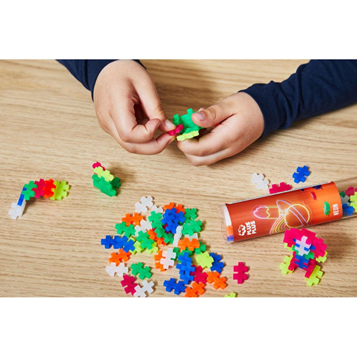 Plus Plus Construction Toy - 100 Piece Fosforlu Mix in Reusable Tube, Made in Denmark Plus Plus Construction Toy - 100 Piece Educational Building Set Plus Plus construction toy, educational toy, creative building set, children's construction toy, Denmark made toy, kids toys, building blocks, creative play, educational building toys, children's educational toys, Denmark made educational toys
