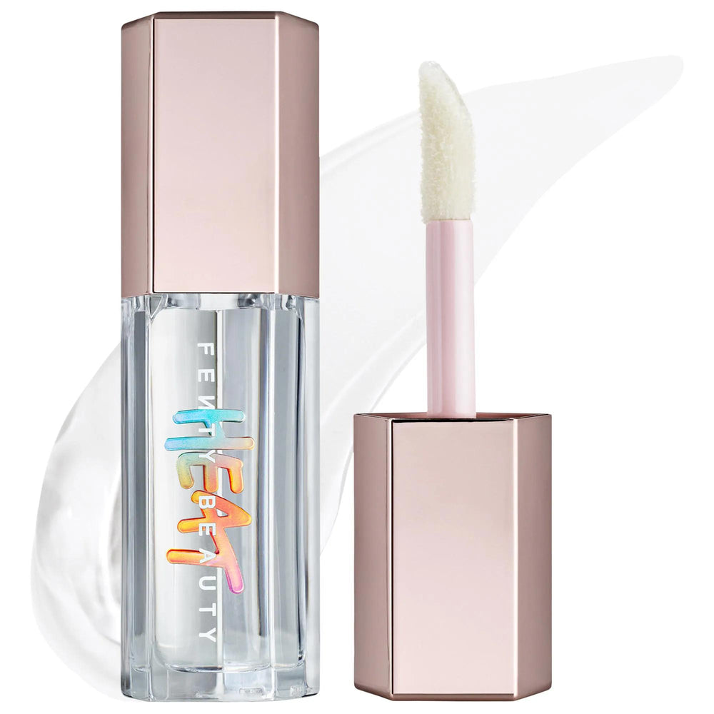 Fenty Beauty Gloss Bomb Heat: Lip Plumper & Luminizer for Fuller, High-Shine Lips | Cruelty-Free Lip Gloss Fenty Beauty Lip Plumper: Get Fuller Lips with High-Shine Gloss lip plumper, lip gloss, lip luminizer, fuller lips, high shine lip gloss, cruelty-free lip gloss, gloss bomb heat, lip plumping gloss, lip gloss, lip shine, plumping lip gloss, lip enhancer, moisturizing lip gloss, shea butter, vitamin E, high-shine finish, hint of tint, lip care, cruelty-free, gluten-free, beauty, cosmetics, makeup, lip m