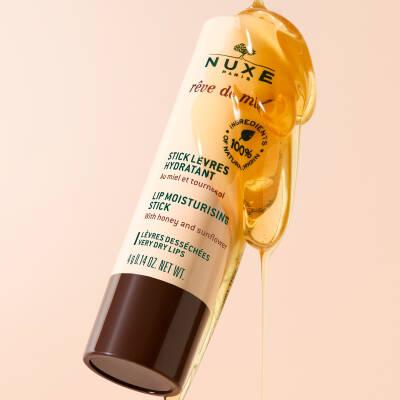 Nuxe Reve de Miel: Natural Honey Lip Balm for Dry, Chapped Lips - Moisturizing Lip Stick, Lip Care & Cracked Lip Treatment Nuxe Honey Lip Balm: Natural Lip Care for Dry, Chapped Lips lip balm, dry lips, chapped lips, natural lip balm, moisturizing lip stick, honey lip balm, Nuxe Reve de Miel, lip care, lip moisturizer, cracked lip treatment, lip repair, lip protection, natural ingredients, skincare, beauty, cosmetic, dry lip treatment, cracked lips remedy, honey, sunflower, shea butter, vitamin E, botanical