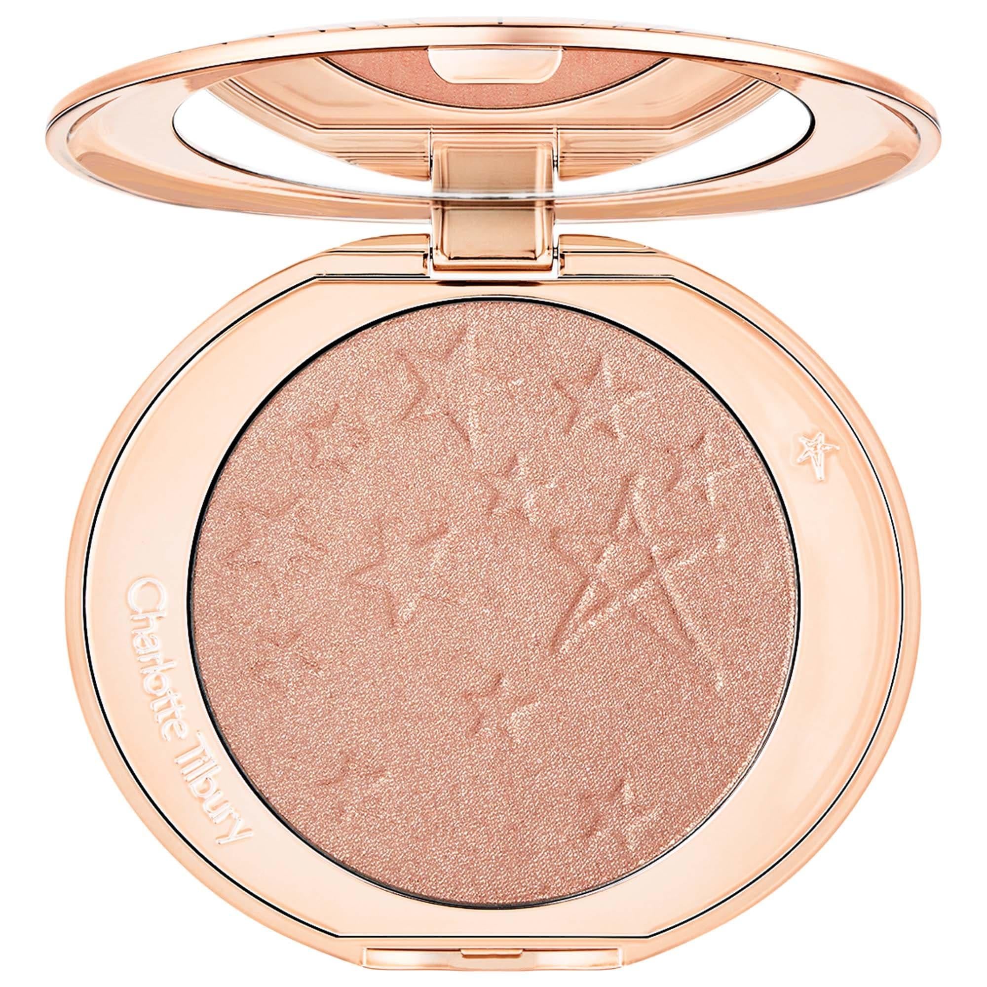 Charlotte Tilbury Glow Glide Face Architect Highlighter - Liquid-Like Powder Highlighter for Radiant Glow, Cruelty-Free, Refillable Compact Charlotte Tilbury Glow Glide Highlighter - Liquid-Like Glow powder highlighter, liquid-like highlighter, sustainable makeup packaging, cruelty-free cosmetics, Charlotte Tilbury Hollywood Highlighter, makeup, face makeup, highlighter, glow, radiant glow, natural glow, sustainable packaging, refillable compact, cruelty-free, Silky Squalane, Smoothing Emollients