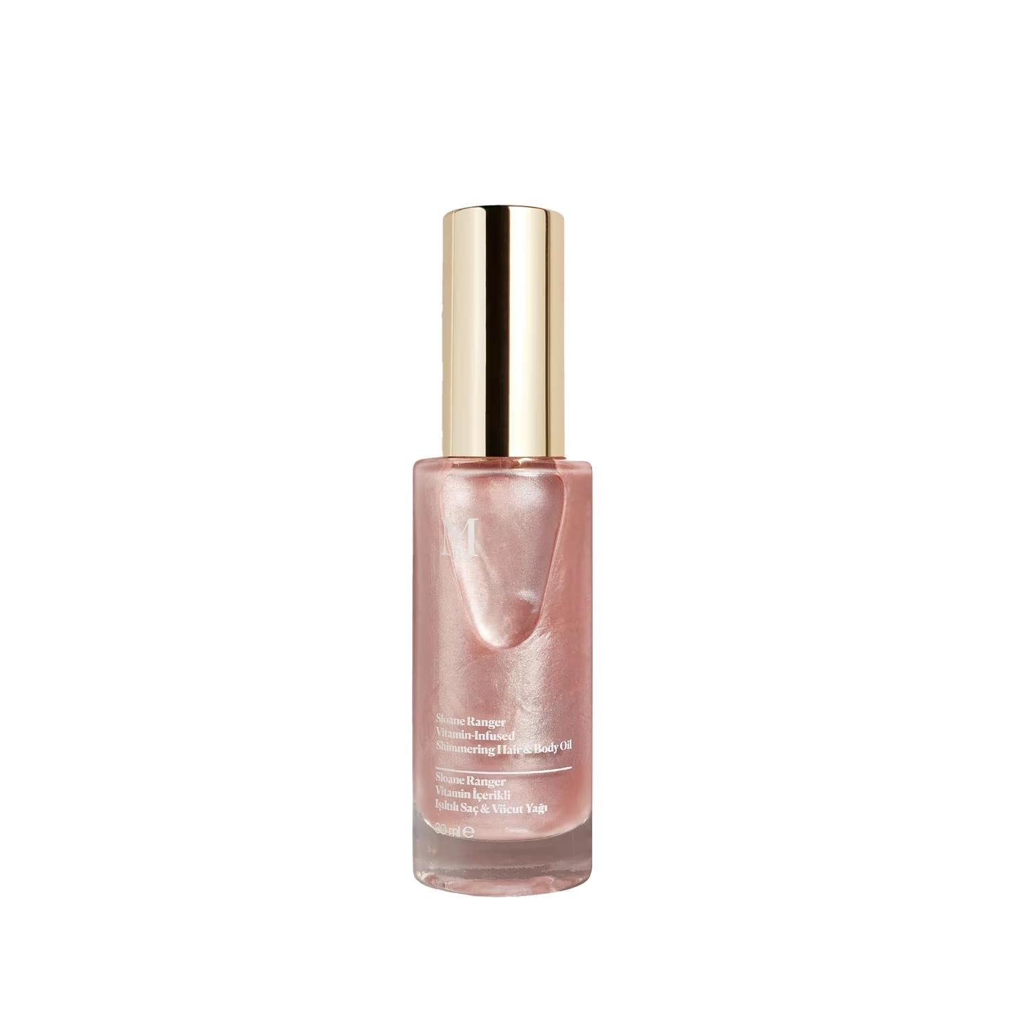 Misbahçe Vitamin-Infused Hair and Body Oil with Shimmering Effect - Nourishing, Moisturizing, 1.01 fl oz Misbahçe Vitamin-Infused Hair & Body Oil - Nourishing & Shimmering Vitamin-infused hair oil, Shimmering body oil, Nourishing hair and skin care, Misbahçe Sloane Ranger, Vitamin-rich cosmetic oil, Hair care, Skin care, Moisturizing oil, Shimmering effect, Beauty essentials, Cosmetic oil, Healthy skin, Healthy hair, Glow, Radiant skin, Radiant hair