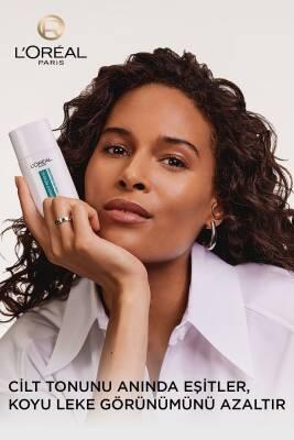 L&#39;Oreal Paris Bright Reveal Tinted Sunscreen Fluid SPF 50 - Dark Spot Corrector, Evens Skin Tone, Medium Tint, Daily Sun Protection L&#39;Oreal Tinted Sunscreen SPF 50: Dark Spot Corrector &amp; Protection tinted sunscreen, SPF 50 sunscreen, dark spot corrector, skin brightening sunscreen, sunscreen with niacinamide, medium tinted sunscreen, Loreal sunscreen, sun protection for dark spots, daily sunscreen fluid, sunscreen, SPF 50, dark spot treatment, skin brightening, niacinamide, medium tint, sun protection, dail