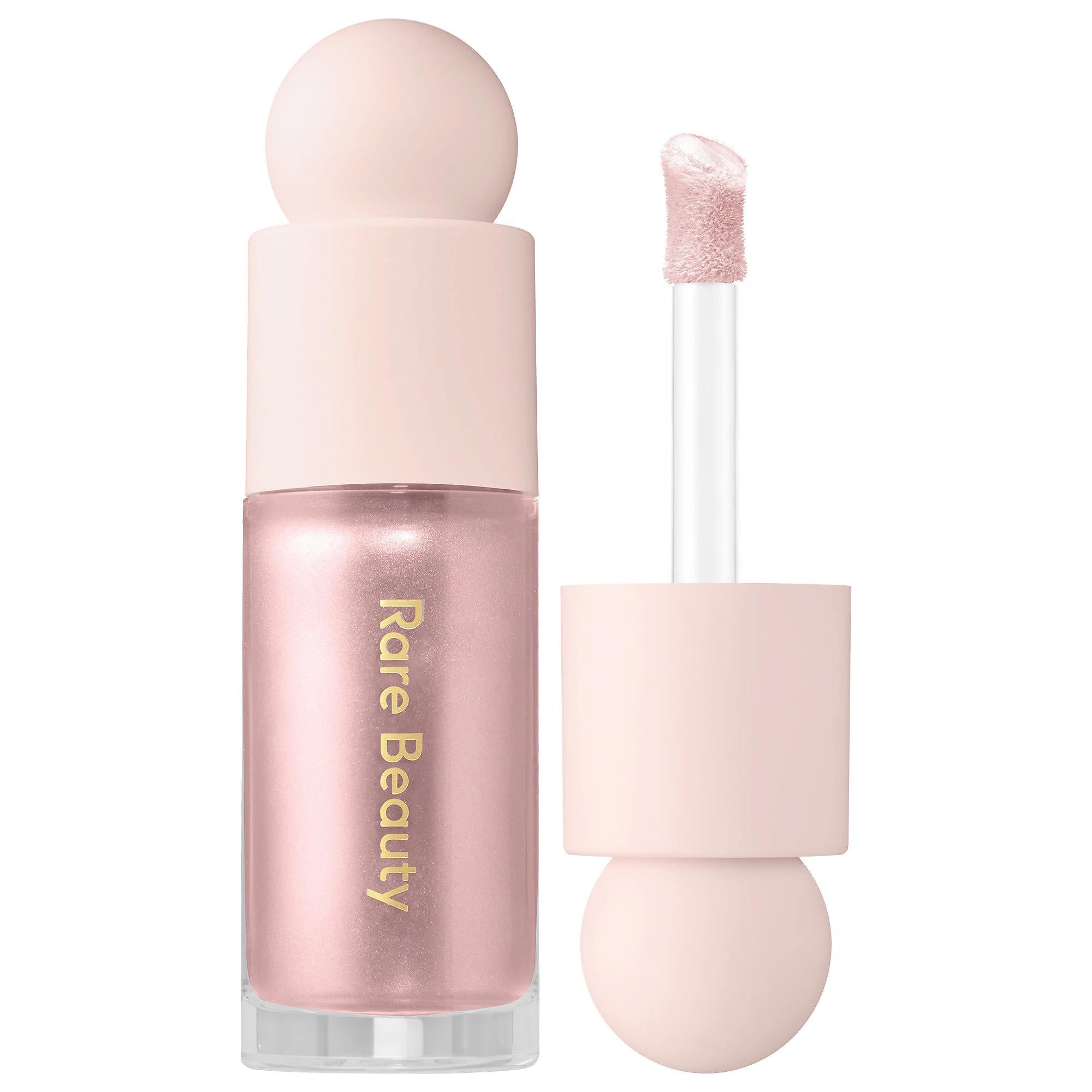 Positive Light Liquid Luminizer: Radiant & Dewy Vegan Highlight for Luminous, Natural Glow - Cruelty-Free, Second Skin Finish Positive Light Liquid Highlighter: Dewy, Luminous, Vegan Glow liquid highlighter, vegan highlighter, cruelty-free highlighter, luminous highlighter, dewy skin makeup, natural glow makeup, pearl highlighter, botanical highlighter, radiant liquid highlighter, second skin highlighter, highlighter, vegan beauty, cruelty-free beauty, luminous finish, dewy glow, natural glow, pearl shimmer