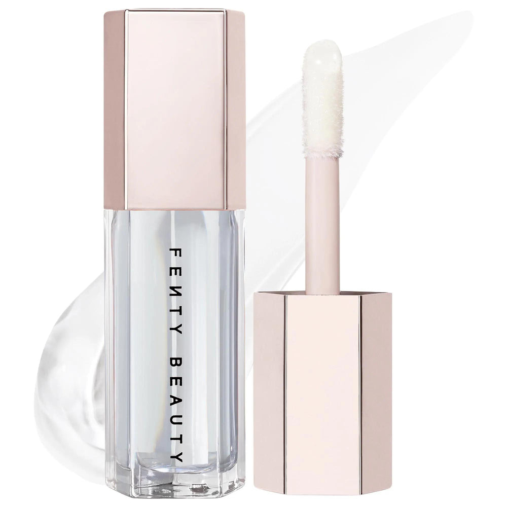 Fenty Beauty Gloss Bomb: Universal Lip Luminizer - Explosive Shine, Hydrating & Non-Sticky Formula for All Skin Tones Fenty Beauty Lip Gloss: Explosive Shine & Hydration lip gloss, shiny lip gloss, universal lip luminizer, non-sticky lip gloss, peach vanilla lip gloss, hydrating lip gloss, cruelty free lip gloss, best lip gloss, gloss bomb, Fenty lip gloss, lip color, lip makeup, high shine, moisturizing lip gloss, cosmetic, beauty product, lip care, everyday makeup, party makeup, cruelty-free, shea butter,