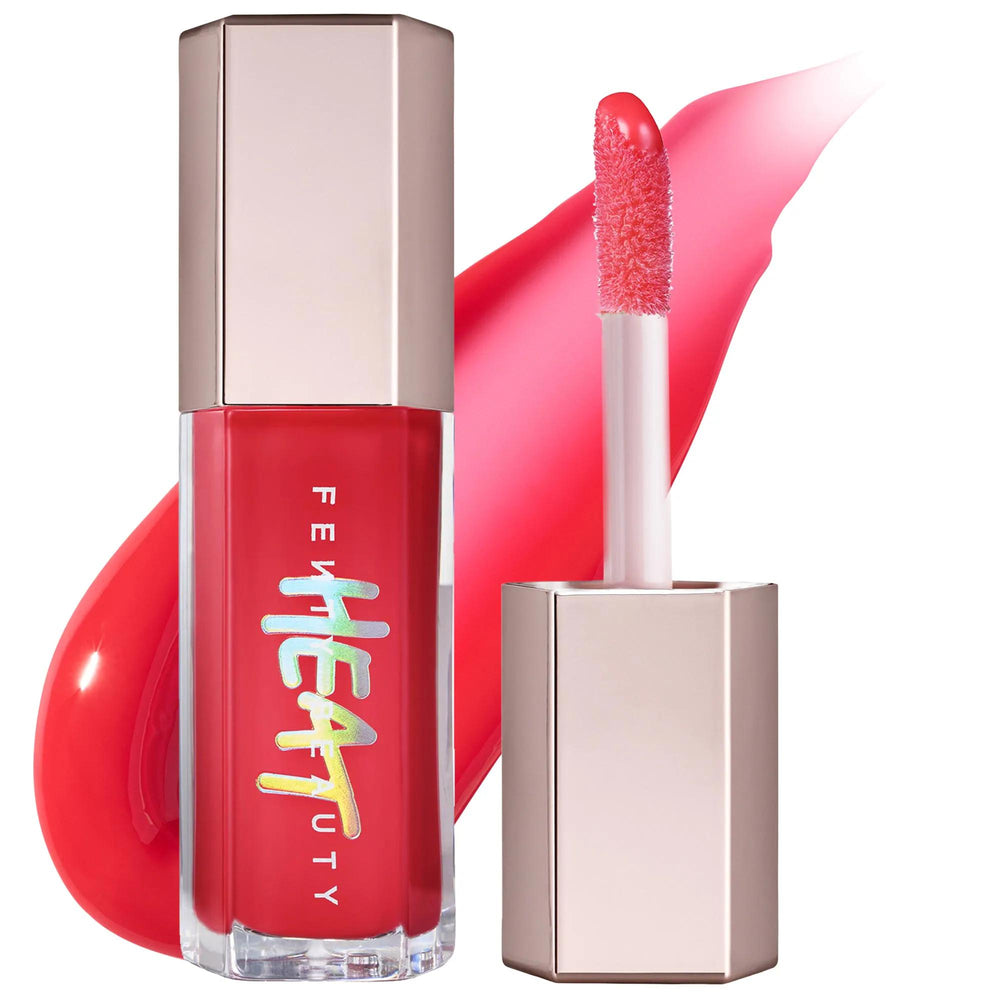 Fenty Beauty Gloss Bomb Heat: Universal Lip Luminizer & Plumper for Fuller Lips, High Shine, Hydration - Enhanced with Shea Butter & Vitamin E Fenty Beauty Lip Plumper: Fuller Lips & High Shine Gloss lip plumper, lip gloss, lip luminizer, shea butter lip gloss, vitamin E lip plumper, high shine lip gloss, tinted lip plumper, cruelty-free lip gloss, gloss bomb heat, lip gloss for fuller lips, lip plumping gloss, hydrating lip gloss, moisturizing lip gloss, lip care, beauty, cosmetics, makeup, lip enhancement