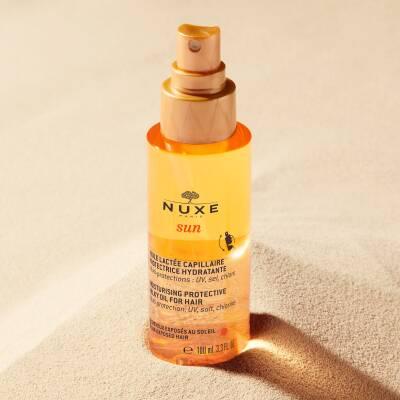 Nuxe Sun: UV Protection Moisturizing Hair Oil - Water Resistant Beach &amp; Summer Hair Care, Protects from Sun, Salt &amp; Chlorine - 3.38 fl oz Nuxe Sun Hair Oil - UV Protection, Moisturizing for Beach &amp; Summer hair oil, sun protection hair, moisturizing hair oil, UV protection hair spray, water resistant hair protection, beach hair protection, summer hair care, Nuxe Sun hair oil, hair sunscreen, chlorine protection hair, hair care, UV protection, moisturizing, water-resistant, lightweight, summer fragrance, dual